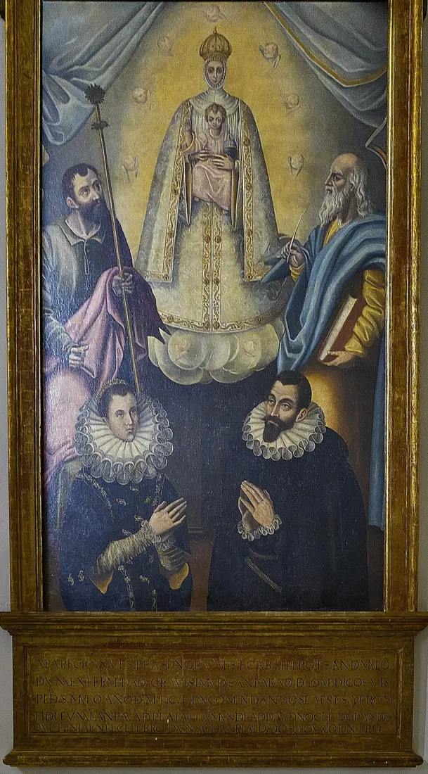 Cuadro exvoto de don Rodrigo de Pacheco orando junto a una dama bajo la Virgen, en la iglesia de San Juan Bautista de Argamasilla de Alba
